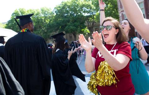 Guests cheer on the graduates.