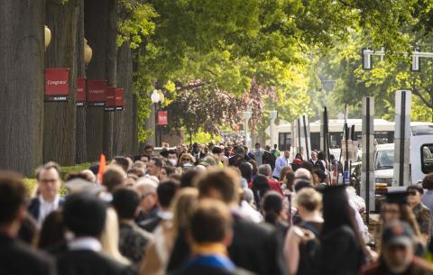 Image of Commencement guests walking towards Killian Court